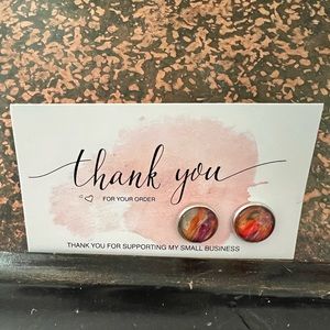 New stud earrings.  Handmade, multi color.  Orange, purple, green.